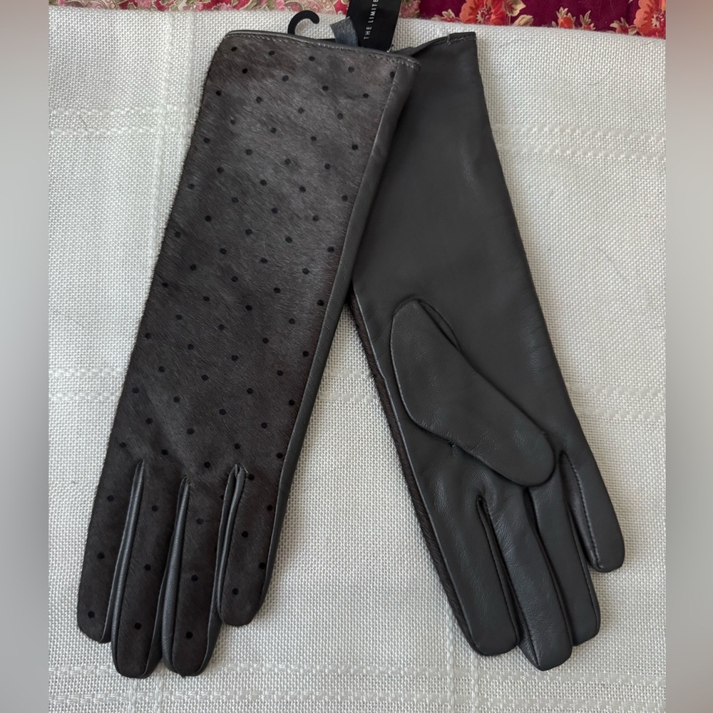 The limited NWT hair calf and leather polka dot gloves. S/M